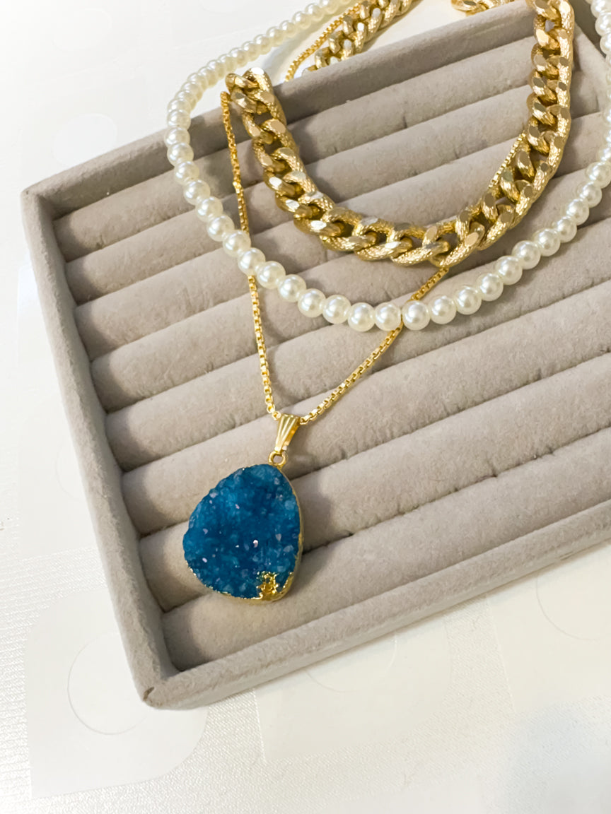 Layered Necklace with blue pendant and pearl strands and gold chain